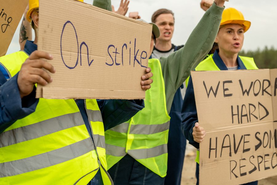 group-of-angry-builders-or-miners-with-placards.jpg